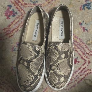 Steve Madden slip on shoes, size 7.5. Worn a few times. Snake-print.